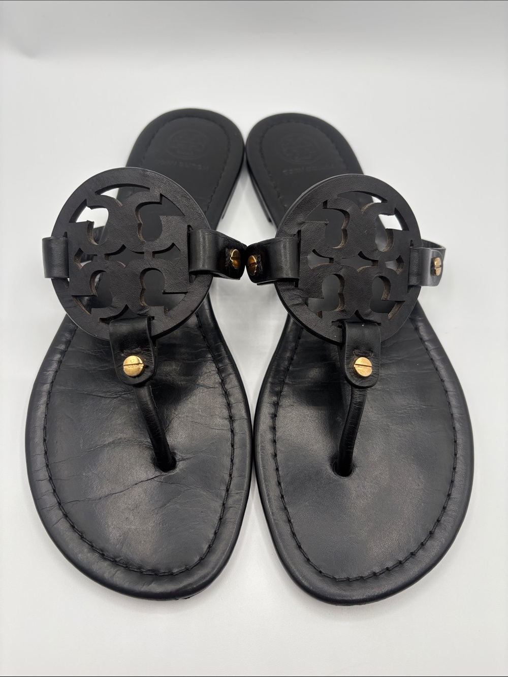 Tory Burch Miller Black Leather Cutout Medallion Thong Sandals